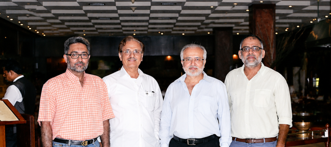 Office bearers and members of the Wheat Traders Association of Pakistan standing together before a meeting